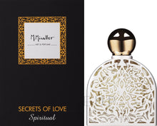 Eau de Parfum Secrets of Love Spiritual by M. Micallef; black box with gold frame and a spherical gold-cap bottle.