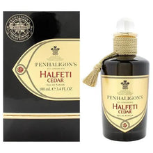 Penhaligon's Halfeti Cedar Eau de Parfum bottle and box, dark brown glass with gold label and rope tassel.