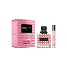 Valentino Donna Born In Roma EDP gift set; pink diamond-pattern bottle with a matching rollerball perfume sample.
