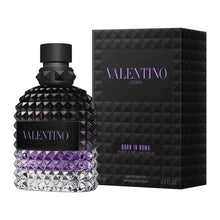 Valentino Uomo Born In Roma Purple Melancholia Eau de Toilette bottle and box set, black textured with purple accents.